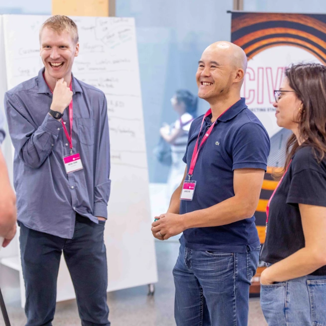 Teams in LaunchVic's CivVic Labs Program collaborating around a whiteboard
